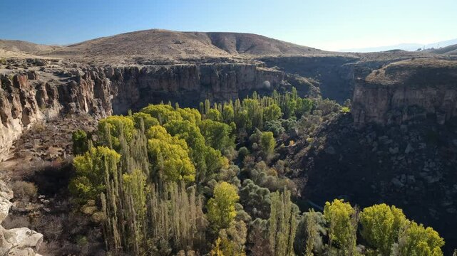 Ihlara valley as autumn begins. Ihlara is a popular tourist attraction in Turkey. Guzelyurt district, Aksaray province, Turkey country - 4k video 
