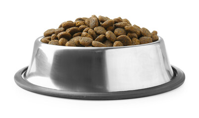Dry pet food granules in feeding bowl isolated on white