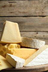 Different types of cheese on table, closeup