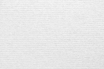 A sheet of white corrugated cardboard texture as background