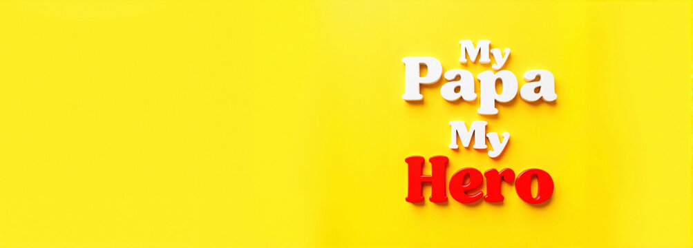 "My Papa My Hero" in bold red and yellow text on bright yellow