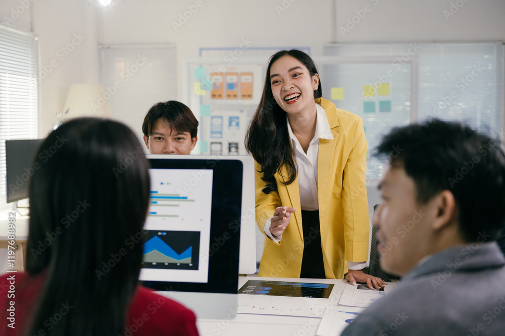 Aufkleber diverse team of asian professionals are actively collaborating in a modern office setting, analyzing