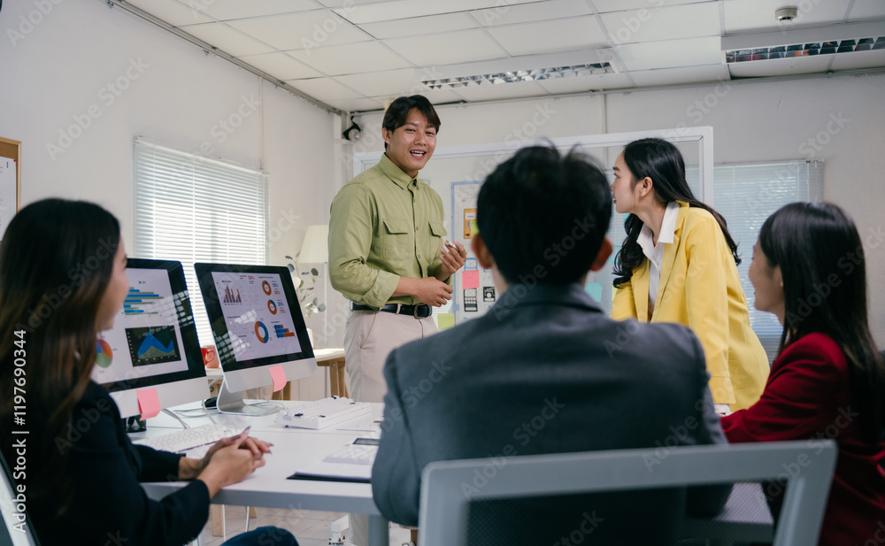 Poster group of young asian businesspeople discussing charts and graphs showing company's growth and analyz