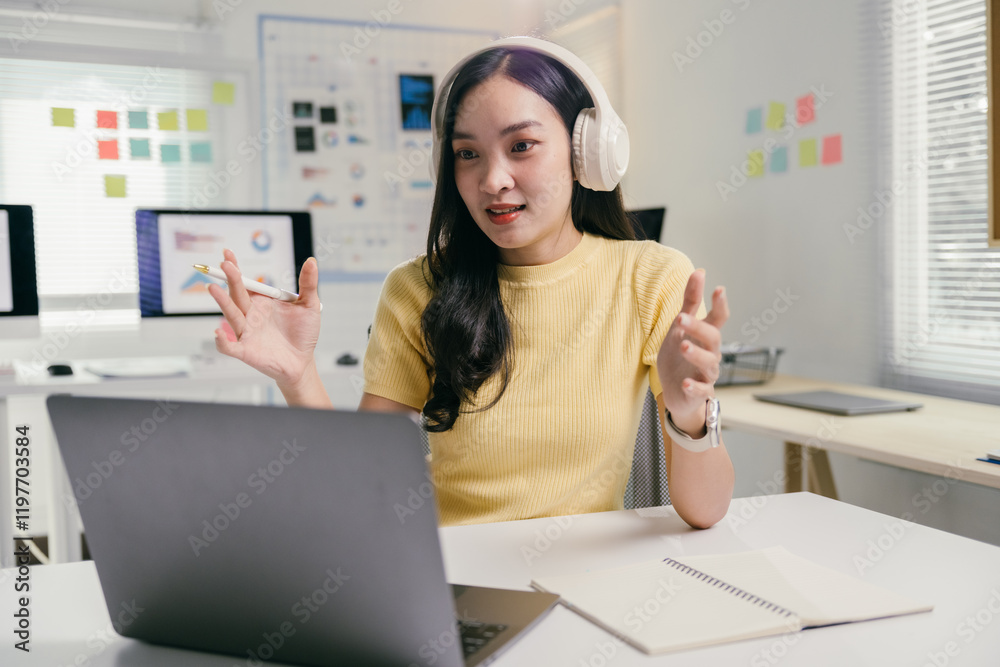 Poster focused businesswoman gestures during a video call, showcasing modern tech and effective communicati