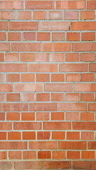 The red brick walls are brittle with age