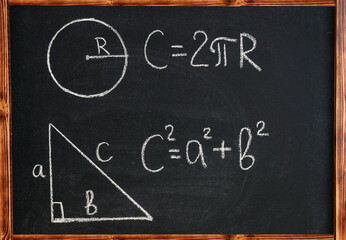 Chalkboard with written formula circumference and pythagorean theorem