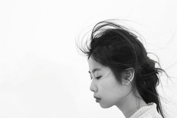 Fototapeta premium Tranquil portrait of a woman in profile
