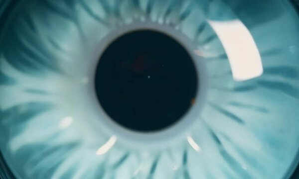 human eye pupil background with macro lens