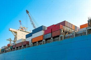 Close up to containers in a cargo ship at a port in Chile