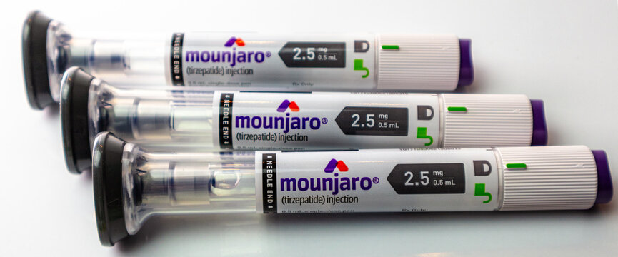 Set of three Mounjaro Tirzepatide pens on white background 