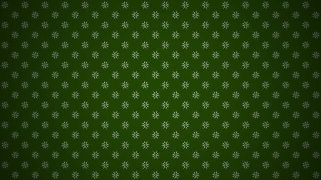 Fondo de color verde con patrones de copos de nieve rotando con vi&ntilde;eta.