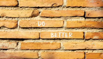 Do better symbol. Concept words Do better on beautiful brown brick wall. Beautiful brown brick wall background. Business and do better concept. Copy space.