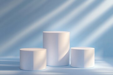 Three White Cylindrical Displays on Blue