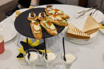 An Elegant Assortment of Gourmet Desserts and Savory Snacks Beautifully Arranged on Table