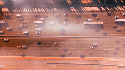 Wildfire smoke blankets Los Angeles highway, disrupting traffic and visibility during fire crisis