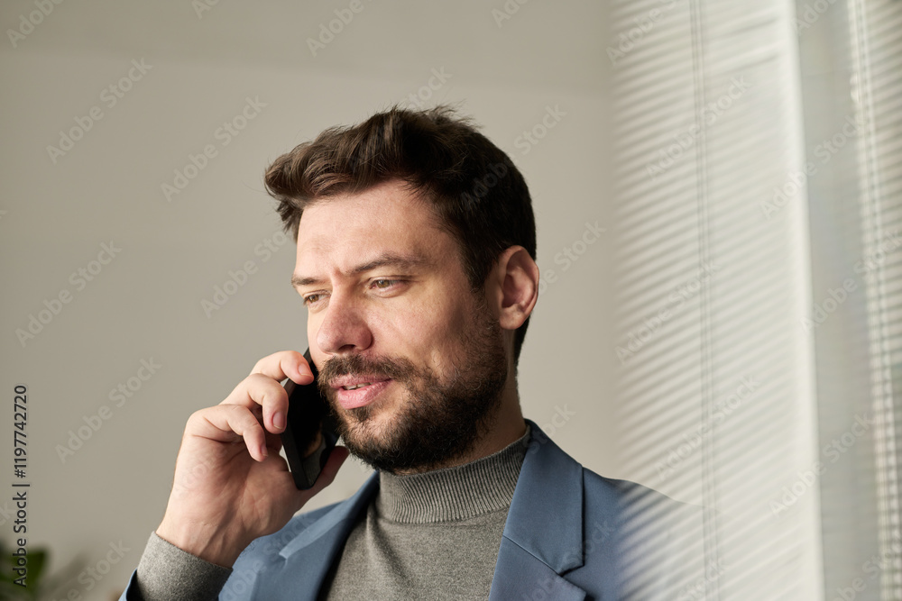 Aufkleber confident manager with smartphone by ear speaking to colleague while organizing work in front of cam