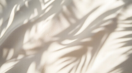 Obraz premium a close up of sand texture with shadows of palm leaves, on a summer day
