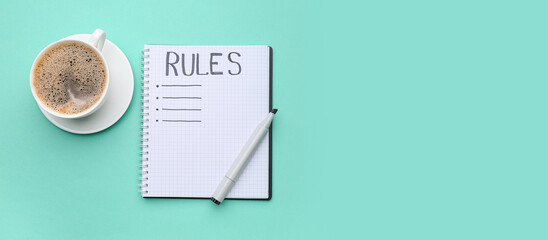 Notebook with blank list of rules and coffee cup on green background
