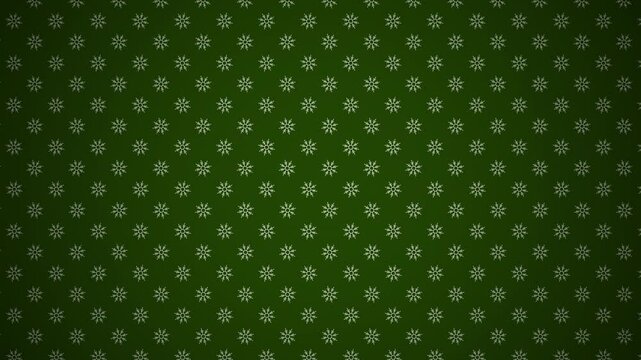 Fondo de color verde con patrones de copos de nieve rotando con un ligero acercamiento y con vi&ntilde;eta.