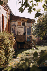 black cat sitting on a fence