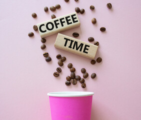 Coffee Time symbol. Concept word Coffee Time on wooden blocks. Beautiful pink background with coffee cup. Business and Coffee Time concept. Copy space