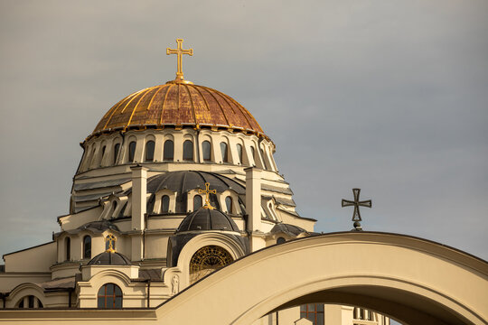 Majestic golden dome of an orthodox church with crosses in Georgia