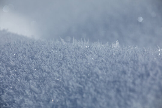 Close-up of delicate frost crystals sparkling in soft light in Georgia