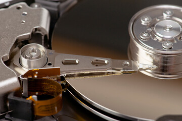 Close-up view of a hard drive arm and platters