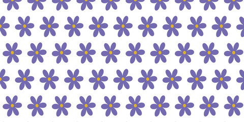 Seamless pattern with purple daisy-like flowers 