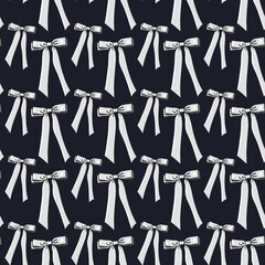 Seamless pattern with white bows,ribbons on a graphite black background. Perfect for holiday decor, gift wrap, fabric, or festive designs. Elegant, classic, and cheerful style for seasonal projects