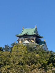 Japanese Castle Tower with Green Roof