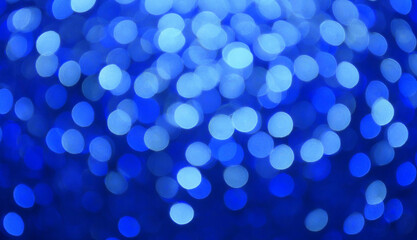 Luz bokeh borrosa en fondo azul oscuro