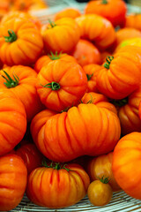Heirloom orange tomatoes with ribbed texture