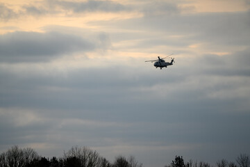 British Royal Navy Agusta-Westland Merlin HM.2 AW101 helicopter hovering on a military exercise over Wiltshire UK