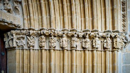 Images carved in stone located in the portico of a church
