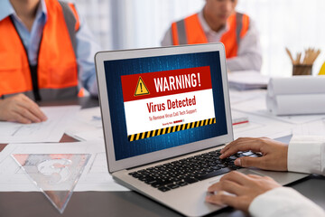Virus warning alert on computer screen detected brisk cyber threat , hacker, computer virus and malware