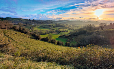 Meadows and woods near Lieres village at dusk, Siero municipality, Asturias, Spain