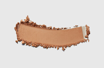 Eye shadow or bronzer make up product brown smudge grey isolated background