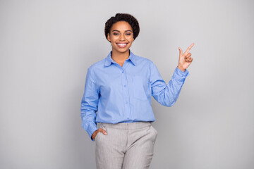 Photo portrait of pretty young bussinesswoman point empty space wear trendy formalwear isolated on...
