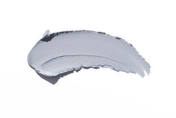 Smear of a gray magnetic or charcoal or clay mask on a white isolated background. Smudge texture brush stroke.