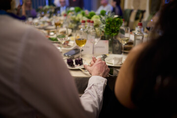 Elegant Wedding Rings and Hands In Close Up At A Beautiful Ceremony Celebrating Love
