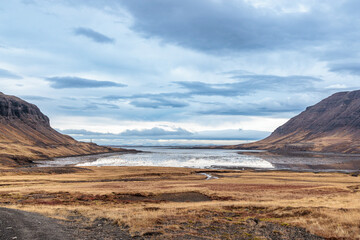 Helgafellssveit gravel road along the coast in the west of Iceland