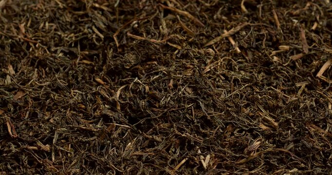 Dried Jimbu (Jimmu, Jamboo, Faran) background texture. It is a herb belonging to the onion family, used extensively in Nepal and in some Himalayan states of India. Table spin. 