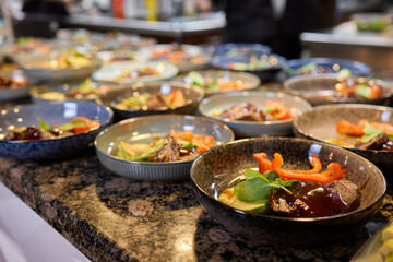 Experience the art of preparing gourmet meals in a high end professional kitchen