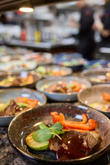 Experience the art of preparing gourmet meals in a high end professional kitchen