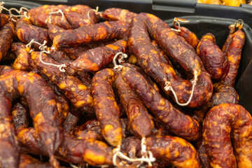 smoked sausages made of pork meat called chouricos, typical gastronomy of northern portugal. Feira...