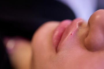 A Close Up View of Stunningly Beautiful Lips That Are Finished with a Glossy Shine and Luster