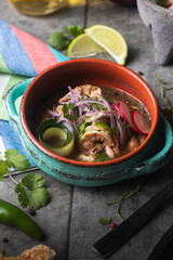 Traditional mexican shrimp ceviche with tomato and serrano pepper