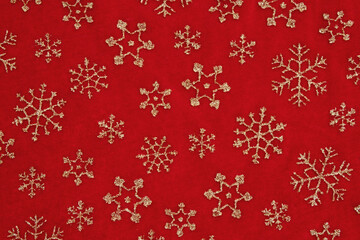Red and Gold Snowflake Pattern on Christmas Background