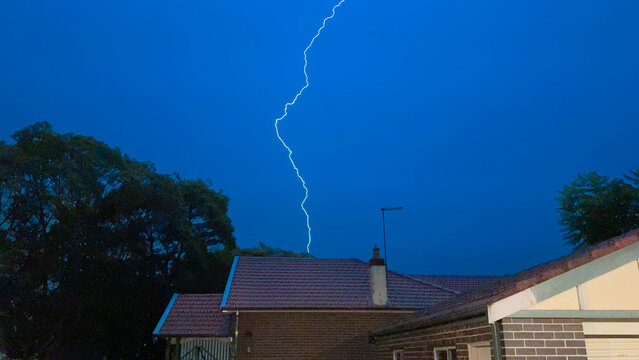Thunderstorm on a Dark night in inner Sydney Suburb with strong rain lightning thunder strong winds Sydney Inner Western Suburbs NSW Australia